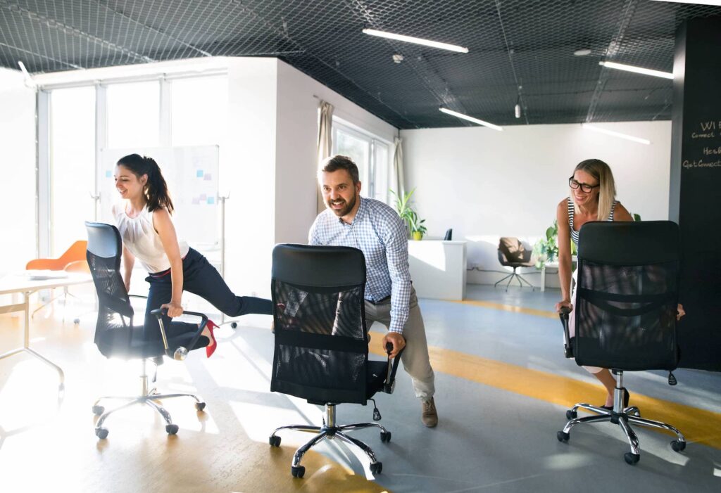 Business People Riding a Chair and Racing